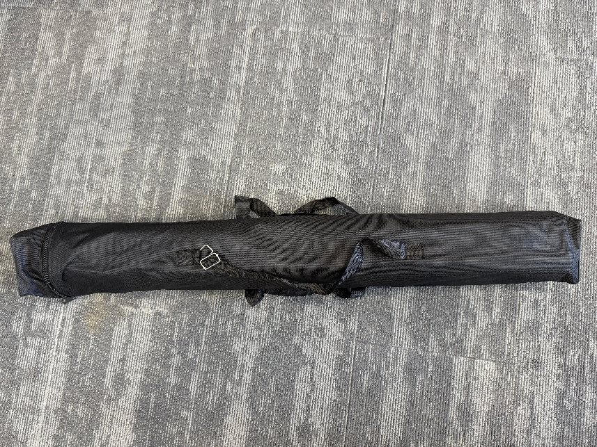 Roll-up banner stand packed into its carry bag