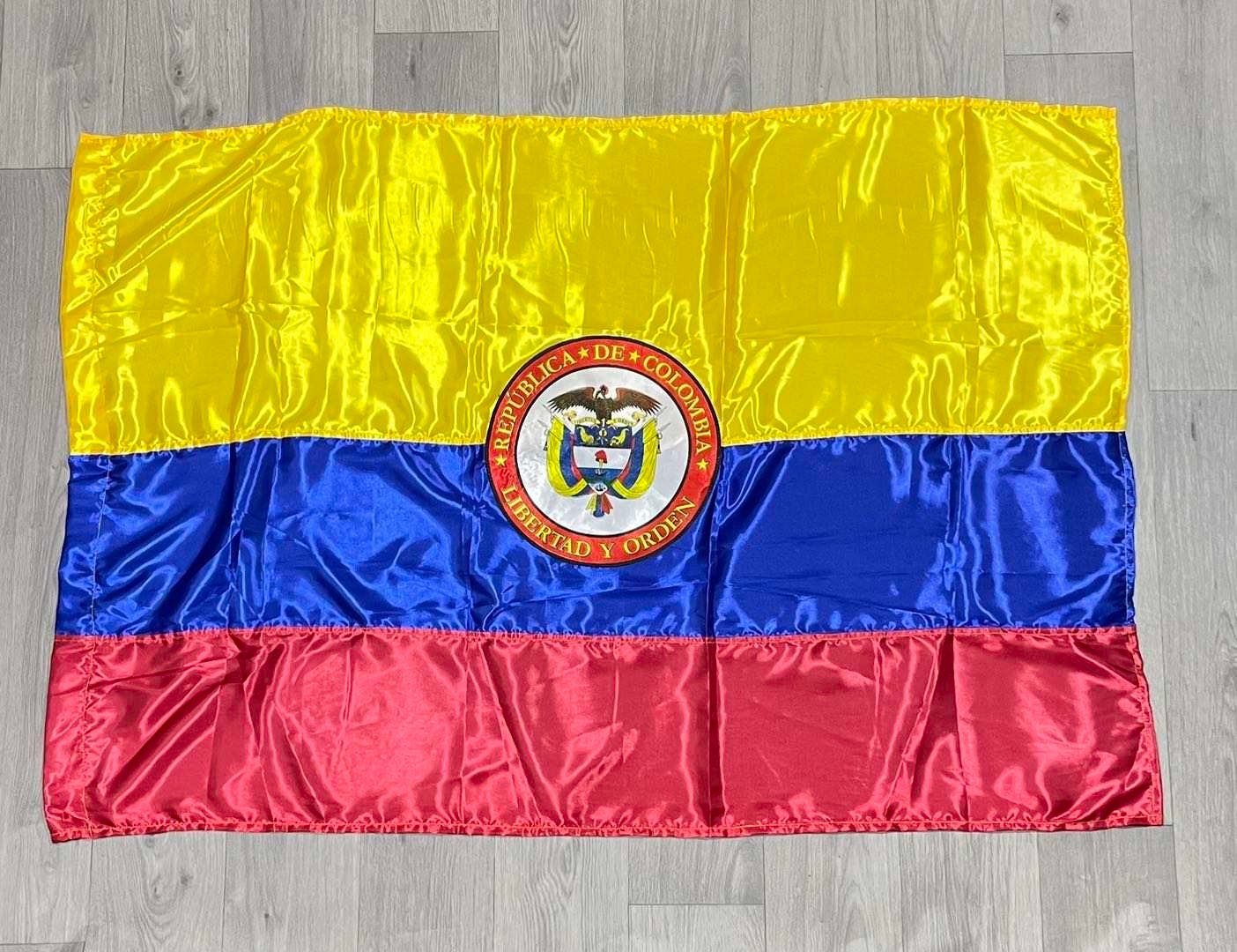Custom printed national flag with embroidered coat of arms detail