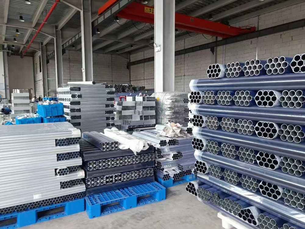 Flagpole tube and aluminium extrusion stock in the warehouse